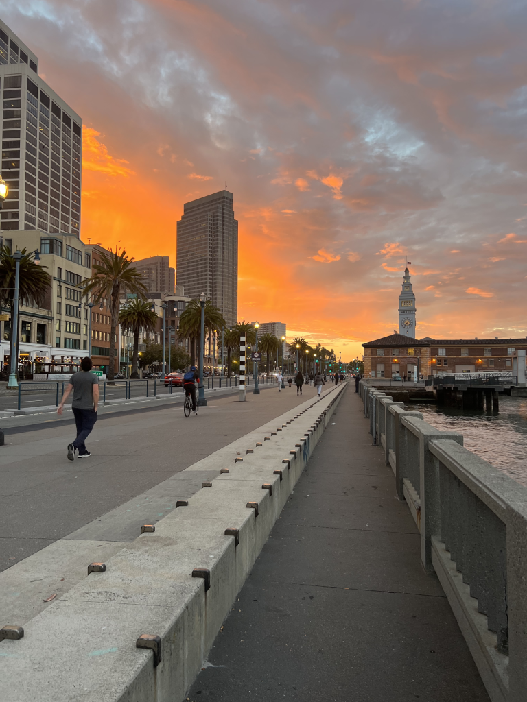 Sunset on The Embarcadero with the clock tower on The Ferry Building in view